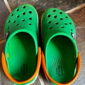 8T green Crocs
